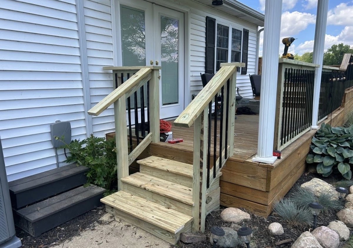New wooden porch steps built by S&S Painting